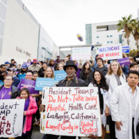 Senator Kamala Harris and a coalition of public, private, nonprofit sector health providers, as well as patients, clients, and beneficiaries of the Affordable Care Act on the steps of LAC-USC Medical Center, January 15,